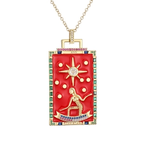Gold plated tarot card pendant necklace with red enamel and colorful zircons on white background