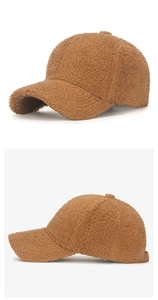 Side and profile views of a brown teddy fleece baseball cap with soft lambswool texture.