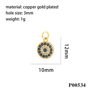 Macro detail of 10mm x 12mm gold plated evil eye pendant with stone inlay measurements