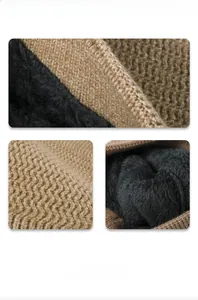 Detail view of khaki knit beanie with thick black fleece lining and premium sewing finish