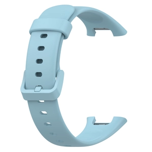 Detail view of the blue silicone replacement strap buckle and adjustment holes for Mi Band 7 Pro