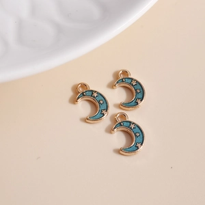 Three pieces of gold-plated crescent moon pendants with teal enamel for DIY jewelry making