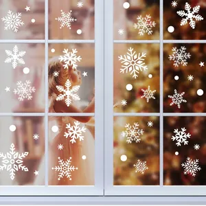 White snowflake window stickers for Christmas glass decoration featuring various snow patterns