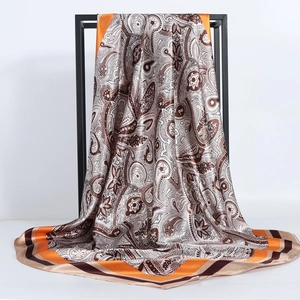 90cm vintage paisley print silk-satin square scarf displayed on a black metal frame