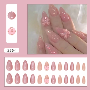 Set unghie finte a mandorla rosa con fiocchi 3D, glitter e finitura a specchio