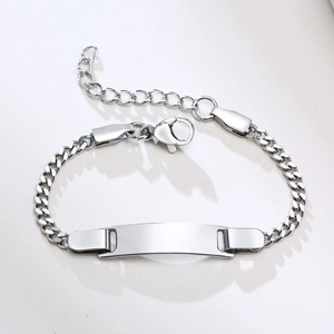 Detailed view of kids stainless steel ID bracelet with flat engravable curved metal plate