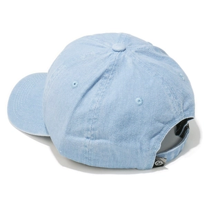 Detail of adjustable strap and textile texture on light blue washed denim baseball cap
