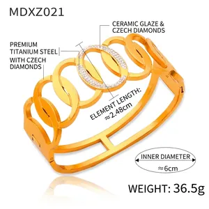 Detail view of titanium steel gold bracelet featuring Czech diamonds and colored ceramic glaze