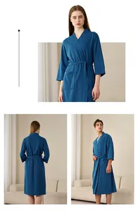 Detailed close-up showing the honeycomb texture of navy blue waffle bathrobe
