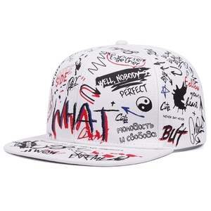 Detailed side view of a white snapback hat featuring colorful graffiti street art patterns