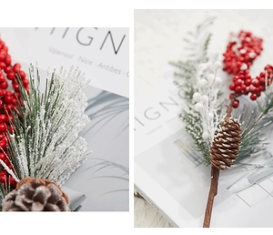 Macro detail of Christmas branch with red berries, pine needles, and natural pine cones