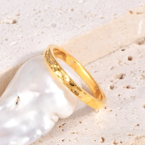 French style 18K gold plated titanium ring with irregular hammered texture on shell