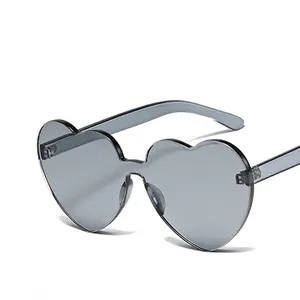 Fashion rimless heart shaped sunglasses with grey translucent lenses and clear frame