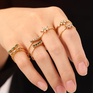 Set of five 18K gold-plated stainless steel rings with zircon floral and geometric designs