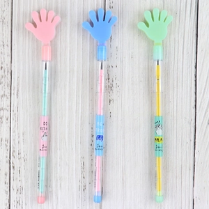 Close-up of pastel stackable pencils with hand gesture toppers and motivational text