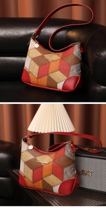 Detail of geometric patchwork underarm bag in red-brown PU leather with gold hardware