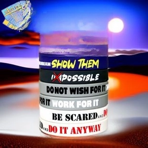 Close-up of colorful silicone wristbands with engraved motivational quotes for sports