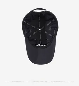 Detail view of the black quick-dry baseball cap showing high-quality interior seams
