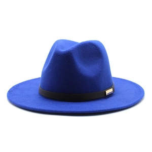 Detailed close-up of a blue felt jazz hat featuring a black ribbon and gold metal buckle