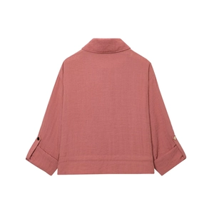 Back view of a dusty pink long-sleeve cotton jacket with adjustable button cuffs