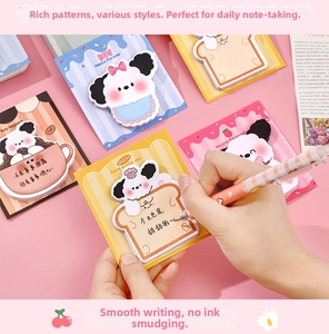 Close-up of cute cartoon animal sticky notes in various shapes with a pink gel pen