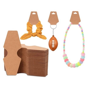 Brown kraft paper display cards with hanging holes for scrunchies and jewelry packaging