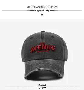 Front view of distressed grey baseball cap featuring red embroidered letters and frayed brim
