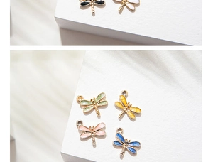 Detailed set of colorful enamel dragonfly charms with gold finish in six vibrant colors