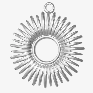 Macro detail of a 304 stainless steel sunburst pendant with a hollow center for DIY jewelry
