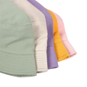 Close-up of colorful twill cotton bucket hats with reinforced stitching detail