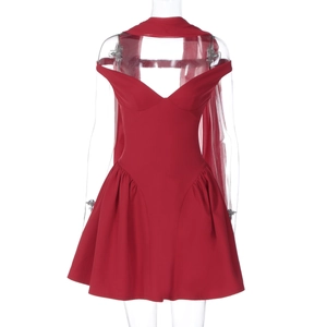 Detail of red V-neck off-shoulder mini dress with matching flowing scarf accessory