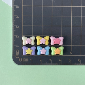 Size measurement of colorful resin bow charms for DIY jewelry and nail art crafts