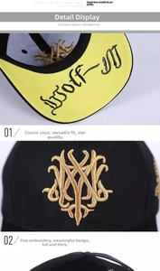 Detailed macro view of the premium gold 3D embroidery on a black cotton baseball cap