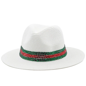 White woven Panama hat with sparkling red and green rhinestone band for summer