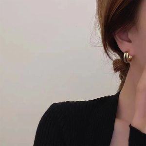 Double layered gold hoop earrings for women featuring a sleek geometric titanium steel design