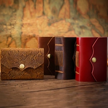 Detailed view of vintage crazy horse leather bookmarks with magnetic closure and embossed floral