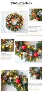 Detail of Christmas wreath featuring red baubles, pine cones, and warm LED fairy lights