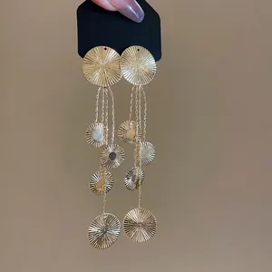Golden S925 silver geometric tassel earrings with radial pleated textures in retro style