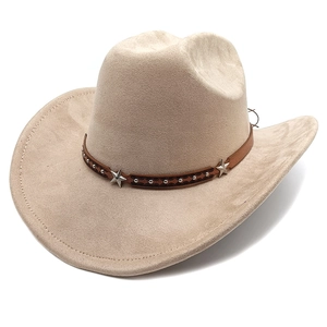 Detail of beige suede cowboy hat featuring star studs and brown decorative band