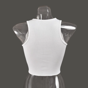 Close-up of white ribbed cropped tank top back with tight fit and U-shaped neckline
