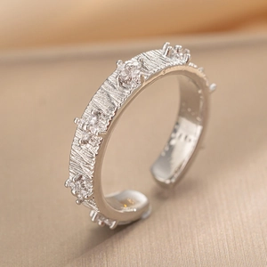 Vintage silver open ring with textured bark surface and sparkling zircon stones for women