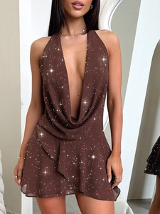 Detail view of sparkly brown halter neck mini dress with deep V-neck and ruffled hemline