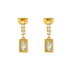 Detail of gold square earrings featuring white pearls and step-cut zircon crystals