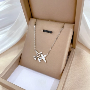 Titanium steel necklace with double airplane pendants and plane engraving on white silk