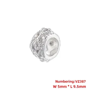 Detail of silver hollow flower charm with zircon stone, size 5mm by 9.5mm, VZ387