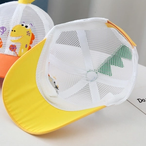 Close-up of kids yellow mesh baseball cap featuring cute dinosaur embroidery and breathable back