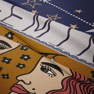 Detailed close-up of velvet texture and vibrant zodiac tapestry pattern in dark blue