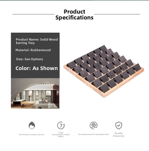Macro detail of wooden earring display tray with 36 slots and soft velvet finish