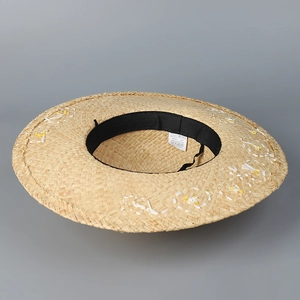 Summer raffia straw sun hat with yellow daisy embroidery and contrasting stripes