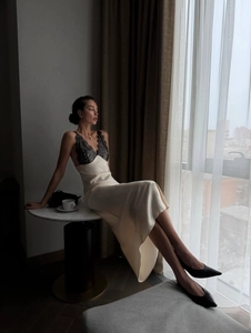 Elegant ivory satin slip dress with black eyelash lace trim and side slit detail